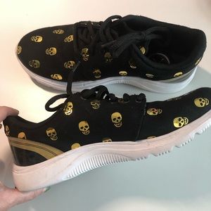 Super cool black with gold skulls running/walking shoes